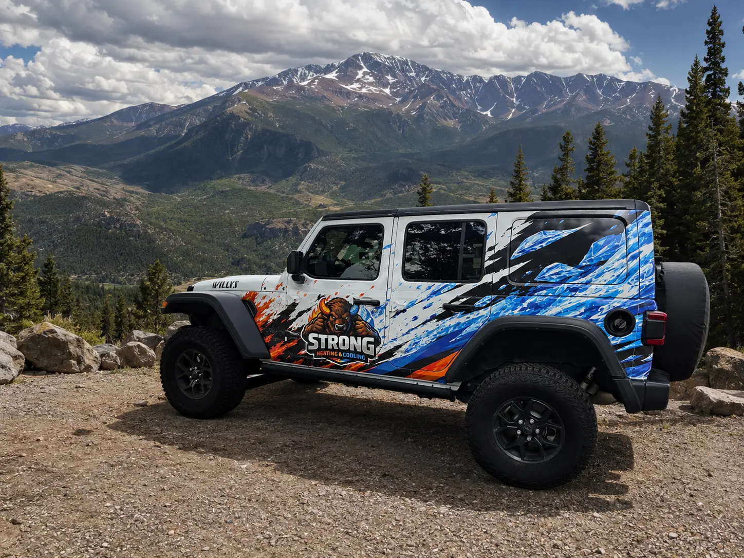 Strong Heating And Cooling wrapped Jeep parked with Pikes Peak in the background